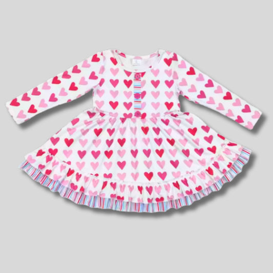 Pink Blue Hearts Ruffle Twirl Dress.  Dress with pink heart background.  Cotton/Spandex blend 2 pink heart print dress with blue striped accents & ruffle hem.  Pull on/ off.  Buttery soft & Stretchy.  Little Gift Nook.