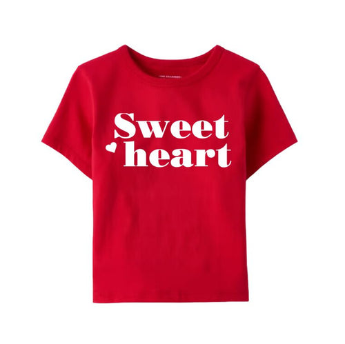 Red Valentine's Sweet Heart T-Shirt. Short sleeved berry red tshirt with white Sweet Heart and heart on front with little heart in white lettering.  Little Gift Nook