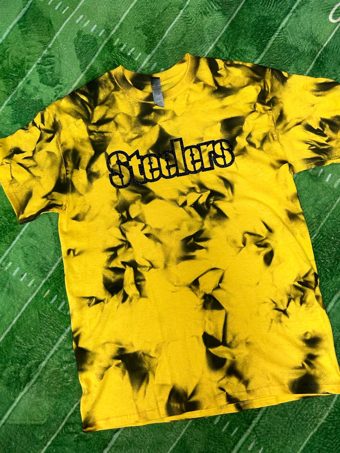 Steelers Dyed Glitter Letter Tshirt. Unisex fit shirts. Yellow black dyed tshirt with black glitter Steelers on front.- Little Gift Nook