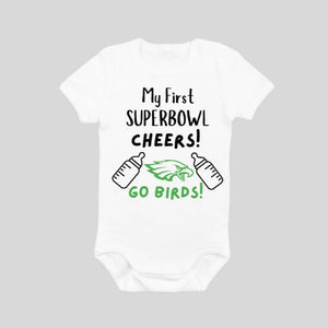 Superbowl Birds Eagles Onesie. White onesie with My First Superbowl Cheers and baby bottles. Go Birds & Eagle on front in green.  Little Gift Nook.