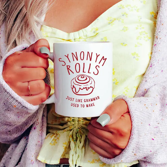 Synonym Rolls - Funny Teacher Pun Coffee Mug - white ceramic 11oz mug with red Synonym Rolls just like Grammar used to make in red lettering on both sides. - English Teacher Mug - Little Gift Nook