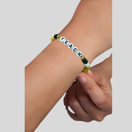 Teach Teacher Beaded Bracelet. yellow, black, and white clay beads with alphabet letter beads TEACH in center. - Little Gift Nook