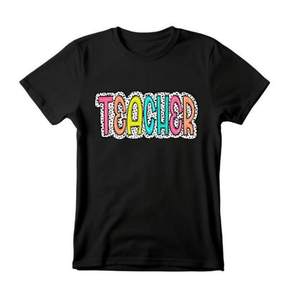 Teacher Dalmatian Dot Color Tshirt - Black unisex tshirt with colorful TEACHER on front and white black dot design. Little Gift Nook