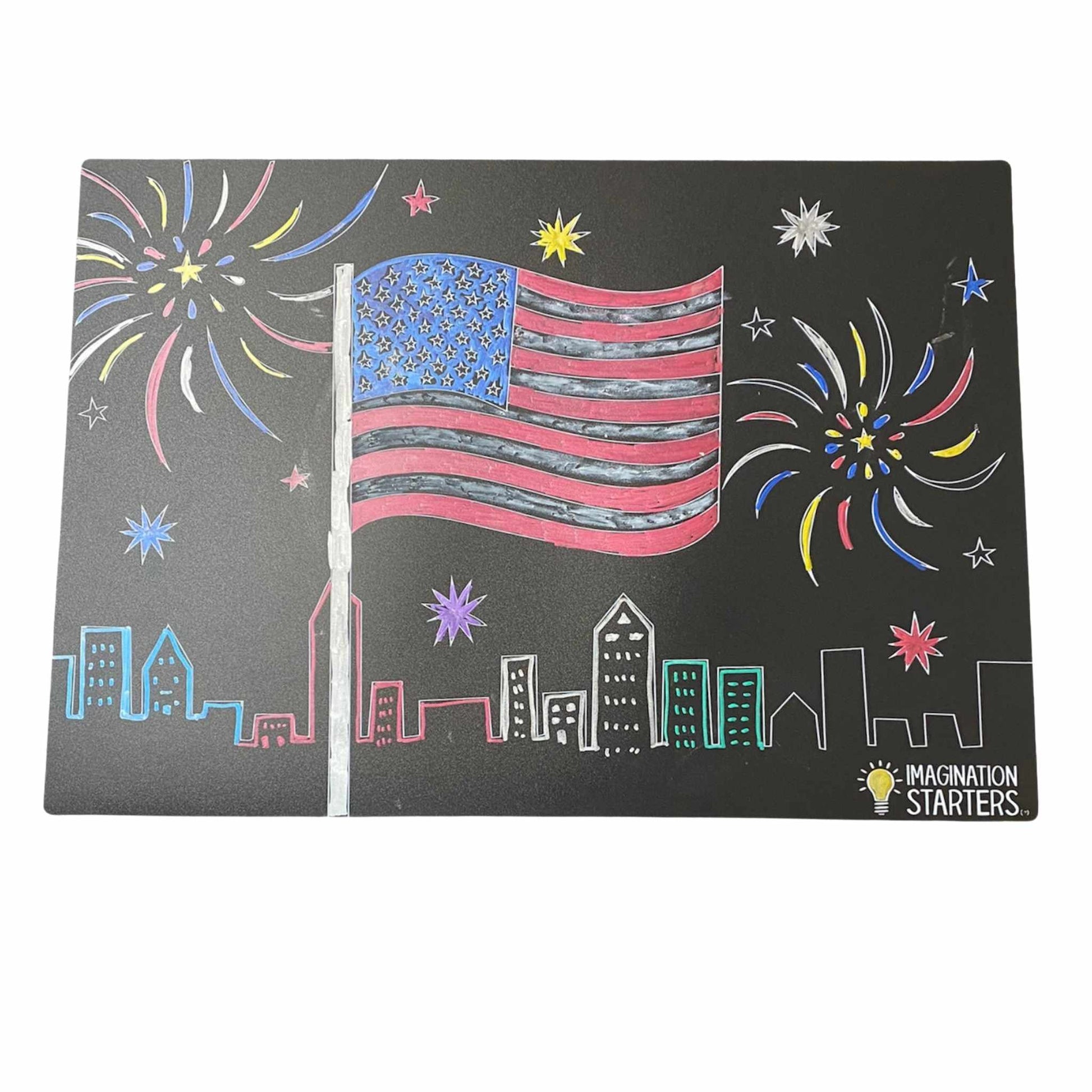 Wipe off Placemat with USA Flag, fireworks, and city skyline colored in sitting on white background.