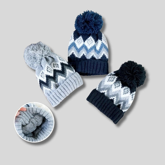 Aztec blue or black soft lined pom knit hats on gray background - Little Gift Nook