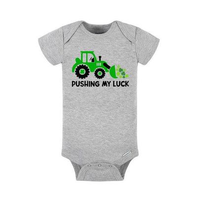 heather gray baby bodysuit with green tractor "pushing my luck" on front.