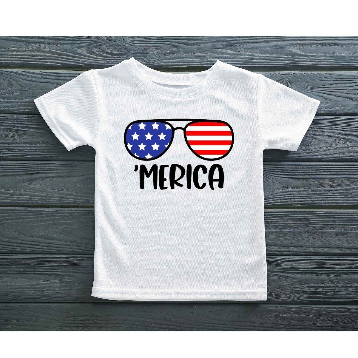white toddler kids tshirt with red blue stars and stripes sunglasses and 'MERICA" in black text - Little Gift Nook