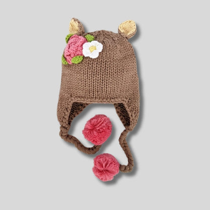 tan knit pink floral deer doe baby toddler hat sitting on light gray background. Little Gift Nook