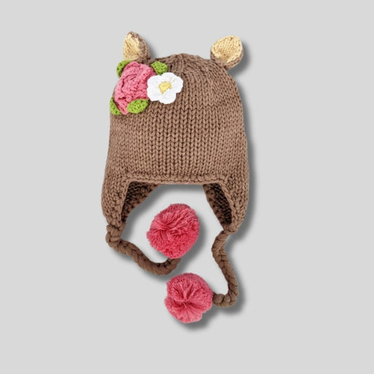 tan knit pink floral deer doe baby toddler hat sitting on light gray background. Little Gift Nook