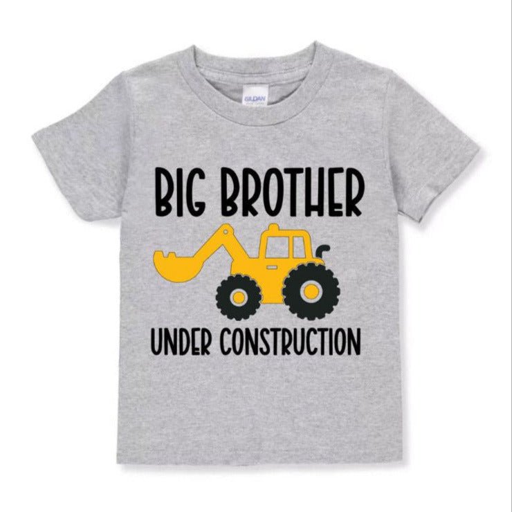 Gray kids Big Brother under construction with yellow front loader tshirt sitting on white background. Little Gift Nook