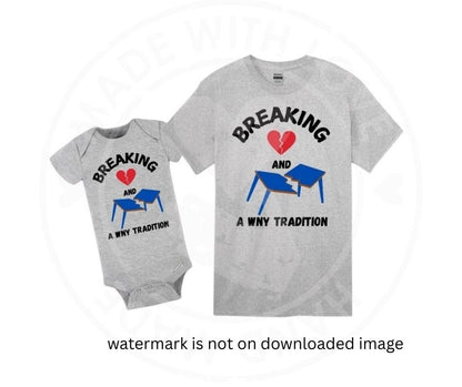 Gray baby onesie or kids tshirt with "Breaking hearts and tables" "A WNY Tradition" text and red broken heart with broken blue table image on fronts. 