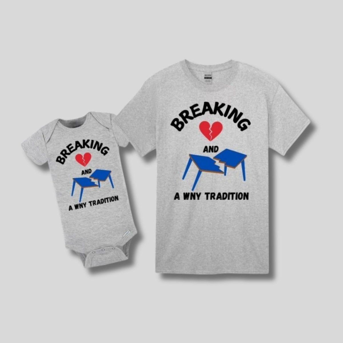 Breaking Hearts & Tables Bills Shirt - Heather Gray short sleeve baby & toddler shirts. Breaking red heart and blue broken table on front. Says WNY Tradition - shirts on gray background.