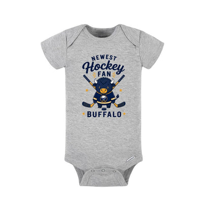 Gray baby onesie with navy yellow Newest Hockey Fan Buffalo image on front sitting on a white background.