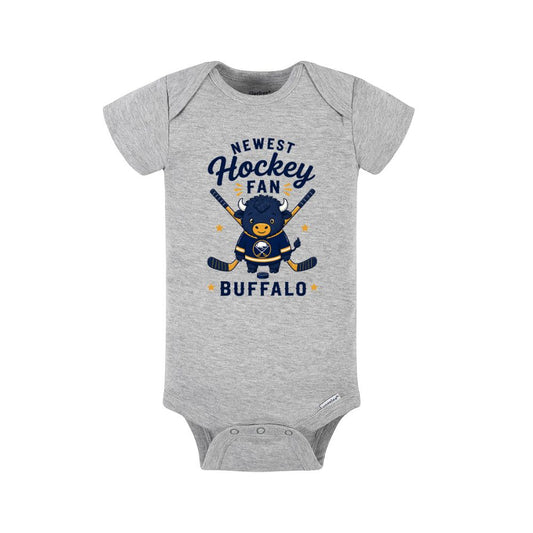 Gray baby onesie with navy yellow Newest Hockey Fan Buffalo image on front sitting on a white background.