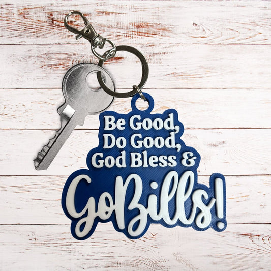 royal blue keychain with 3d white lettering mvp Josh Allen quote "Be Good, Do Good, God Bless and Go Bills!" laying on wood background. 