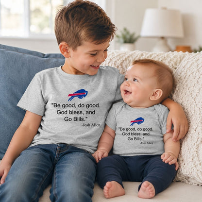 A young boy and a baby sitting together on a couch, both wearing matching light gray t-shirts with a Buffalo football MVP Josh Quote printed on the front.