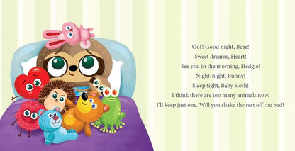 Inside Can you put me to bed sloth in bed with stuffy toys.