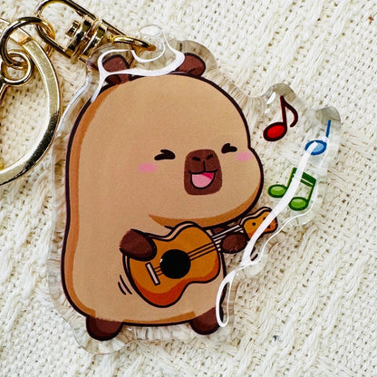 Capybara playing guitar keychain. Capybara Acrylic Keychains with metal ring and clip. Double sided.  Little Gift Nook.