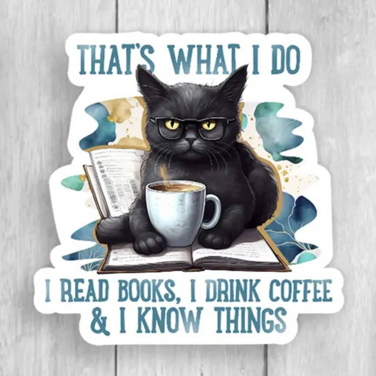 Sticker with black cat wearing glasses holding coffee on a book and text "That's what I do" "I read books, drink coffee, and I know things" on a wood background. 