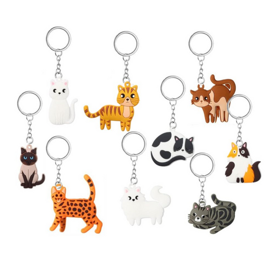 Cat Kitty Plastic Keychain. Each measure approx 1.5" - 2" and come with chain and metal keyring . Soft bendable plastic.  Little Gift Nook.