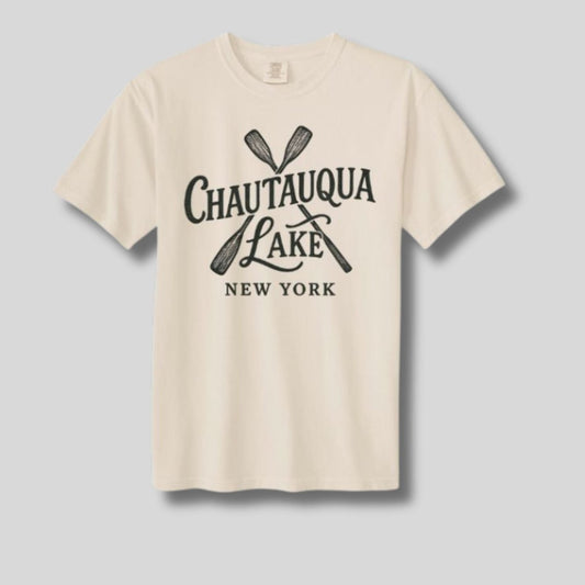 Beige tshirt with gray sketched paddles and "Chautauqua Lake New York" on front on a gray background.