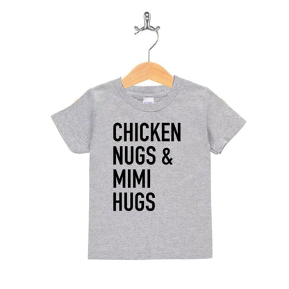 Heather gray kids tshirt on hanger with black text on front "Chicken Nugs & Mimi Hugs" on a white background.