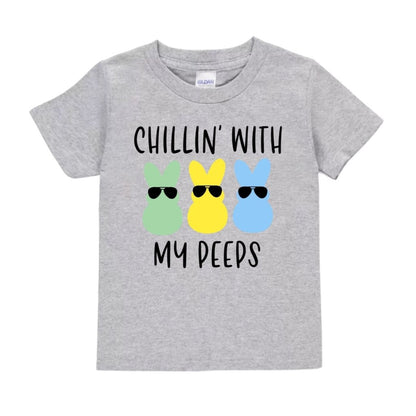 Chillin' With My Peeps Kids Easter Tshirt in heather gray with black lettering and green, yellow, and blue bunny peeps in sunglasses on front.  Little Gift Nook.