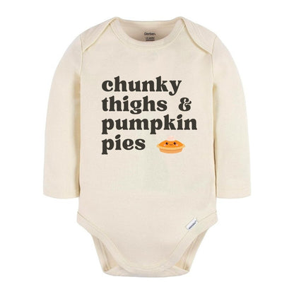 Creme baby onesie with "chunky thighs and pumpkin pies" on front in black lettering with little orange pumpkin pie with face. Onesie sitting on white background. 