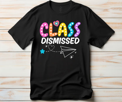 Black Class dismissed paper airplane tshirt on a light wood background. Little Gift Nook