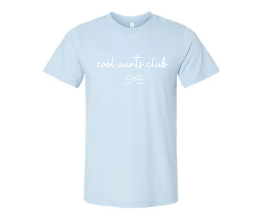 Cool Aunts Club Baby Blue T-Shirt with white bow on front on a white background. Little Gift Nook