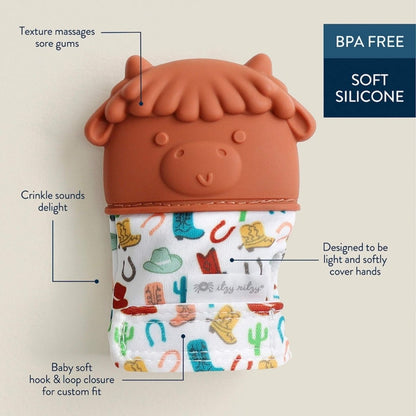 Baby teething mitt cow details on a tan background. Little Gift Nook
