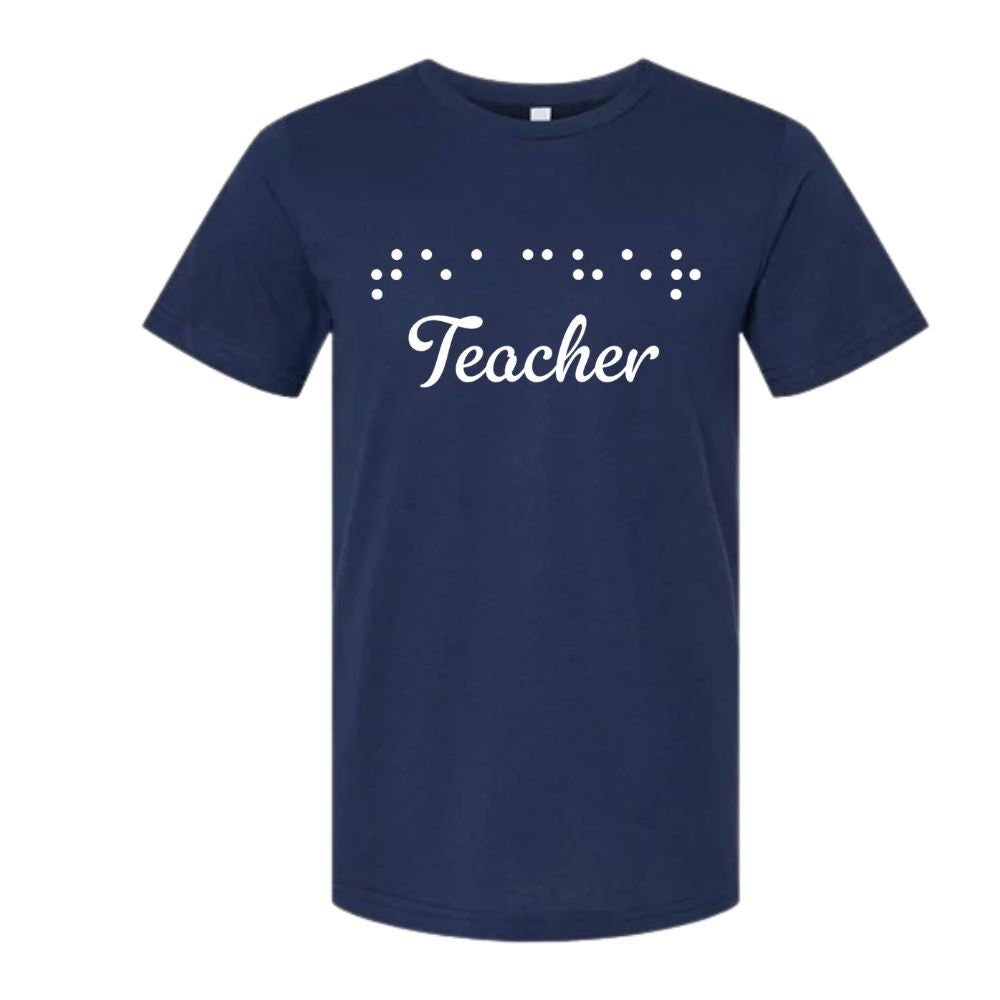 Navy personalized Braille t-shirt featuring the word Teacher in white script lettering with raised Braille dots above. Custom Braille apparel shirt displayed on a white background.