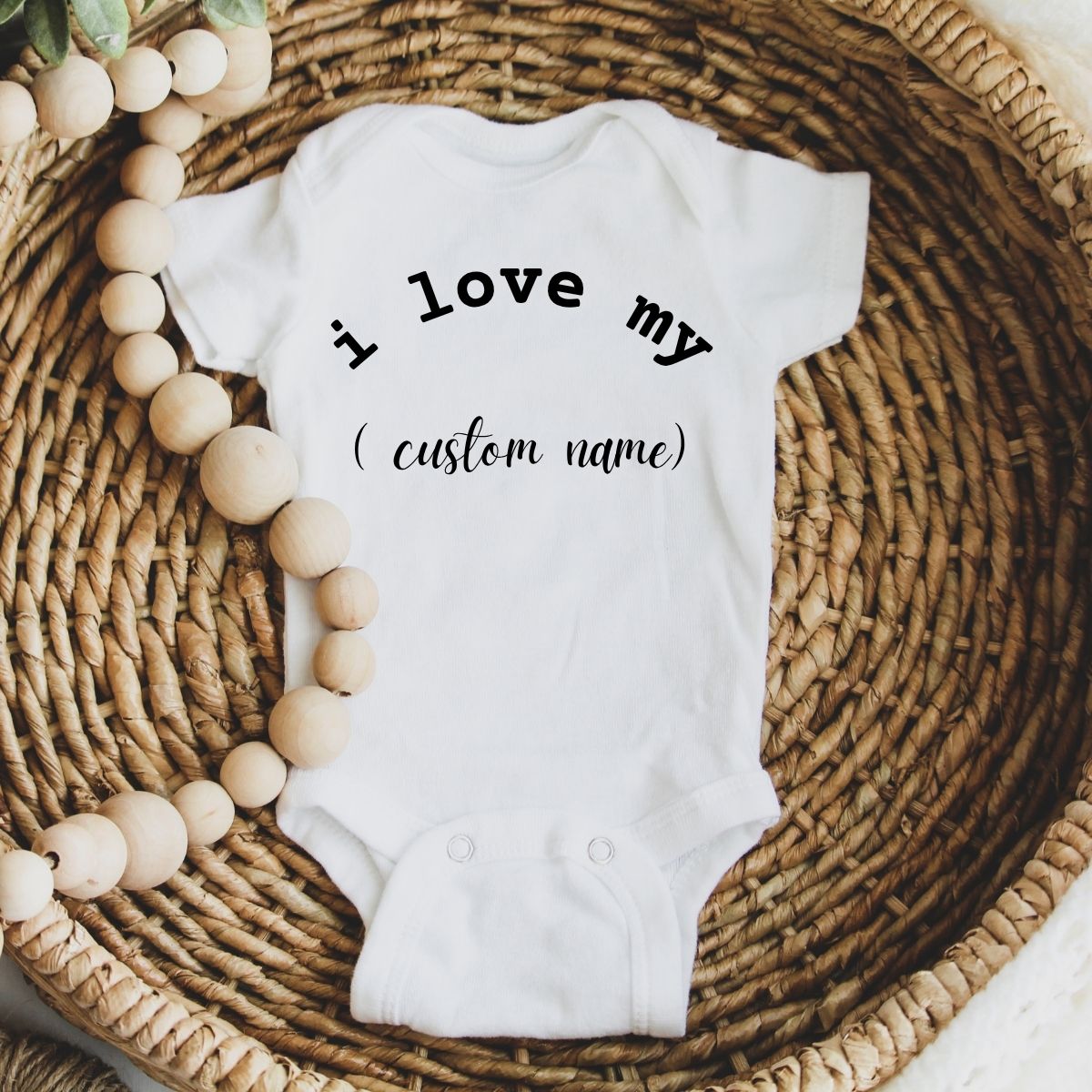White personalized custom baby ones "I love my" custom name in wicker basket with beads