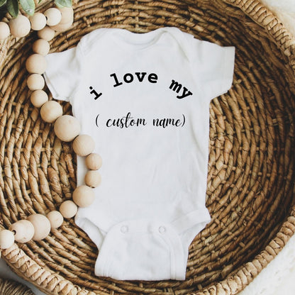 White personalized custom baby ones "I love my" custom name in wicker basket with beads