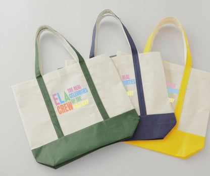 canvas tote bags with colorful digital image with text "ELA Crew. The Real celebrities of the hallway" on front.