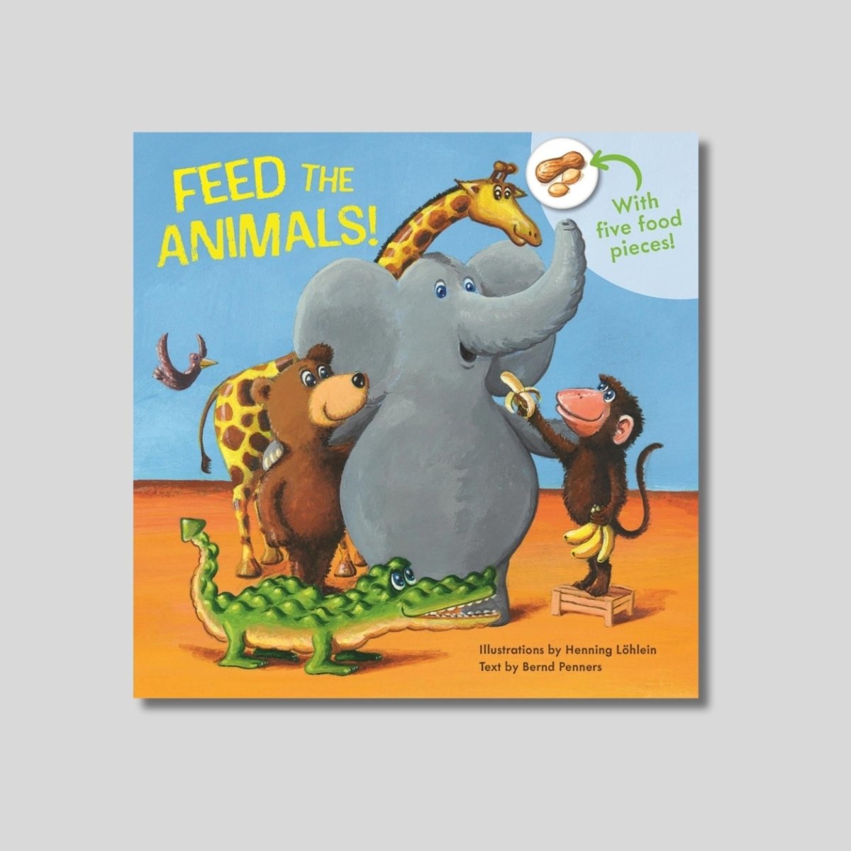 Hard board book cover of Feed the animals interactive book with faux food pieces cover on a light gray background.
