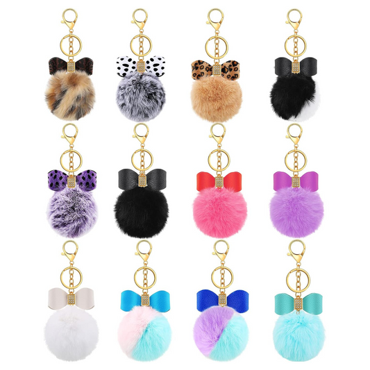 Fuzzy pom pom faux leather bow gem keychain with lobster clip. 12 different colors and patterns. Little Gift Nook.