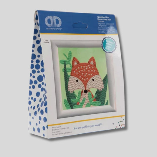 Diamond Dotz Fox Diamond Art Craft Kit Woodland Fox package sitting on gray background. 