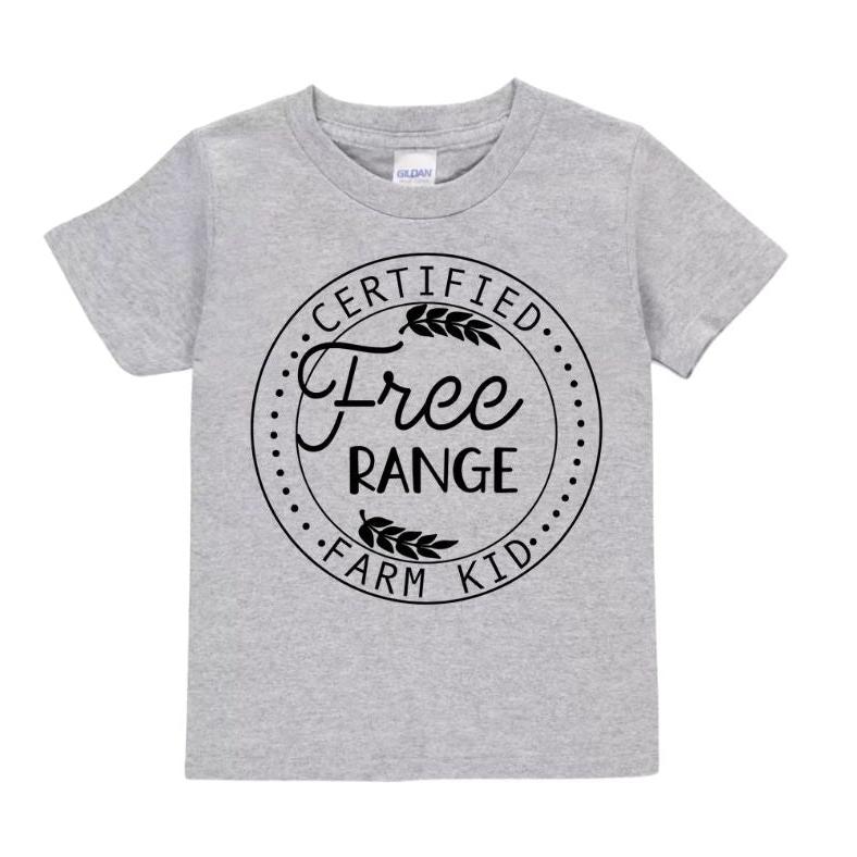 Heather gray toddler t-shirt with black circular design and "Certified Free Range Farm Kid" on front laying on white background.