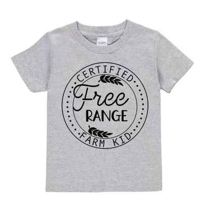Heather gray toddler t-shirt with black circular design and "Certified Free Range Farm Kid" on front laying on white background.