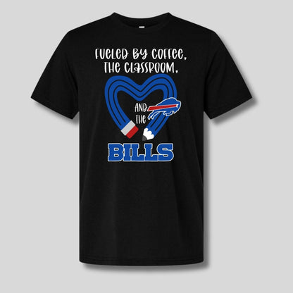Black t-shirt with a blue pencil heart design and 'fueled by coffee, the classroom, and the bills' on front on gray background.