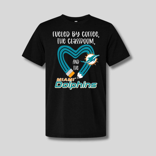 Black tshirt with teal yellow pencil and "fueled by coffee, the classroom, and the dolphins" on front. Little Gift Nook