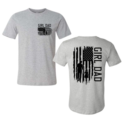 Gray t-shirt with 'Girl Dad' American Flag graphic on front and back of shirt sitting on white background.