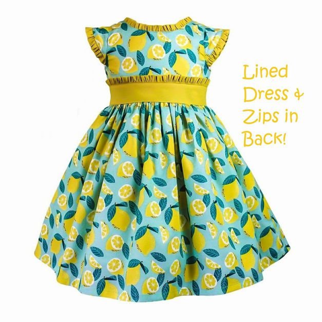 Girl's teal and yellow lemon print ruffle dress that is lined and zips in back. 