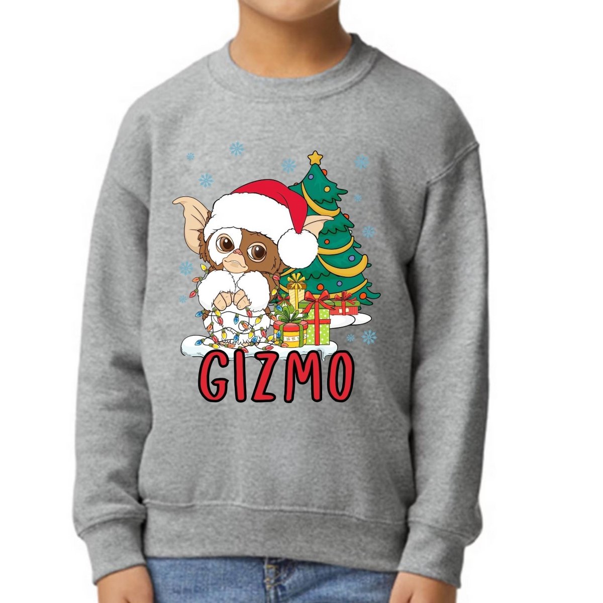Child wearing light gray Gizmo Holiday Christmas sweatshirt standing on white background. 