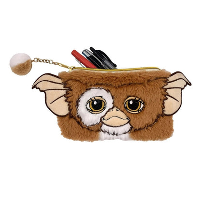 Gremlins Gizmo plush wristlet purse or pencil case sitting on white background with pens sticking out. 