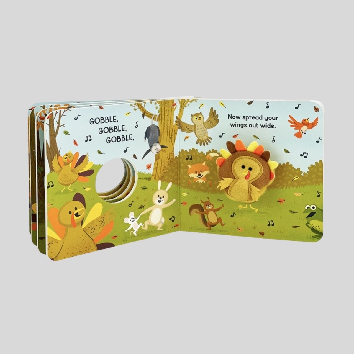 Inside mini Gobble Gobble puppet board book with little turkey and instructions how to dance like a turkey. 