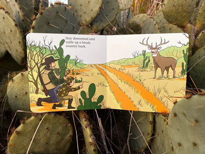 Inside Good Luck Hunters board book with father and son hunting big buck. 