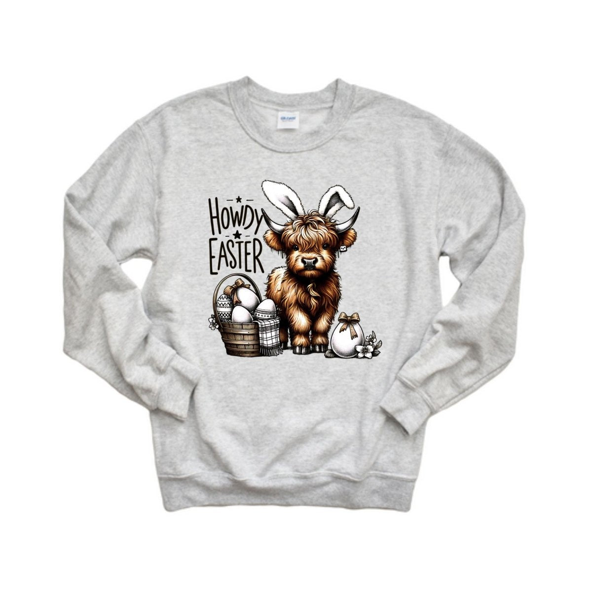 Gray sweatshirt with cow wearing bunny ears with easter eggs and basket "Howdy Easter" on front on a white background. Little Gift Nook