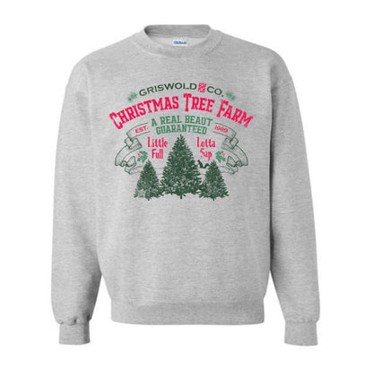 Heather gray pink and green Griswold Christmas Tree Farm sweatshirt on white background.